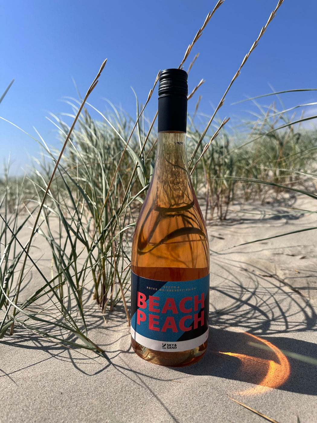 Beach Peach - Secco mit rotem Weinbergpfirsich – BEACH PEACH